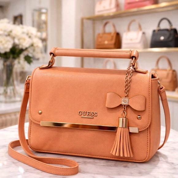 Guess Handbags - GUESS Peach Saffiano Crossbody Top Handle Bag w/ Bow Tassel & Long Strap